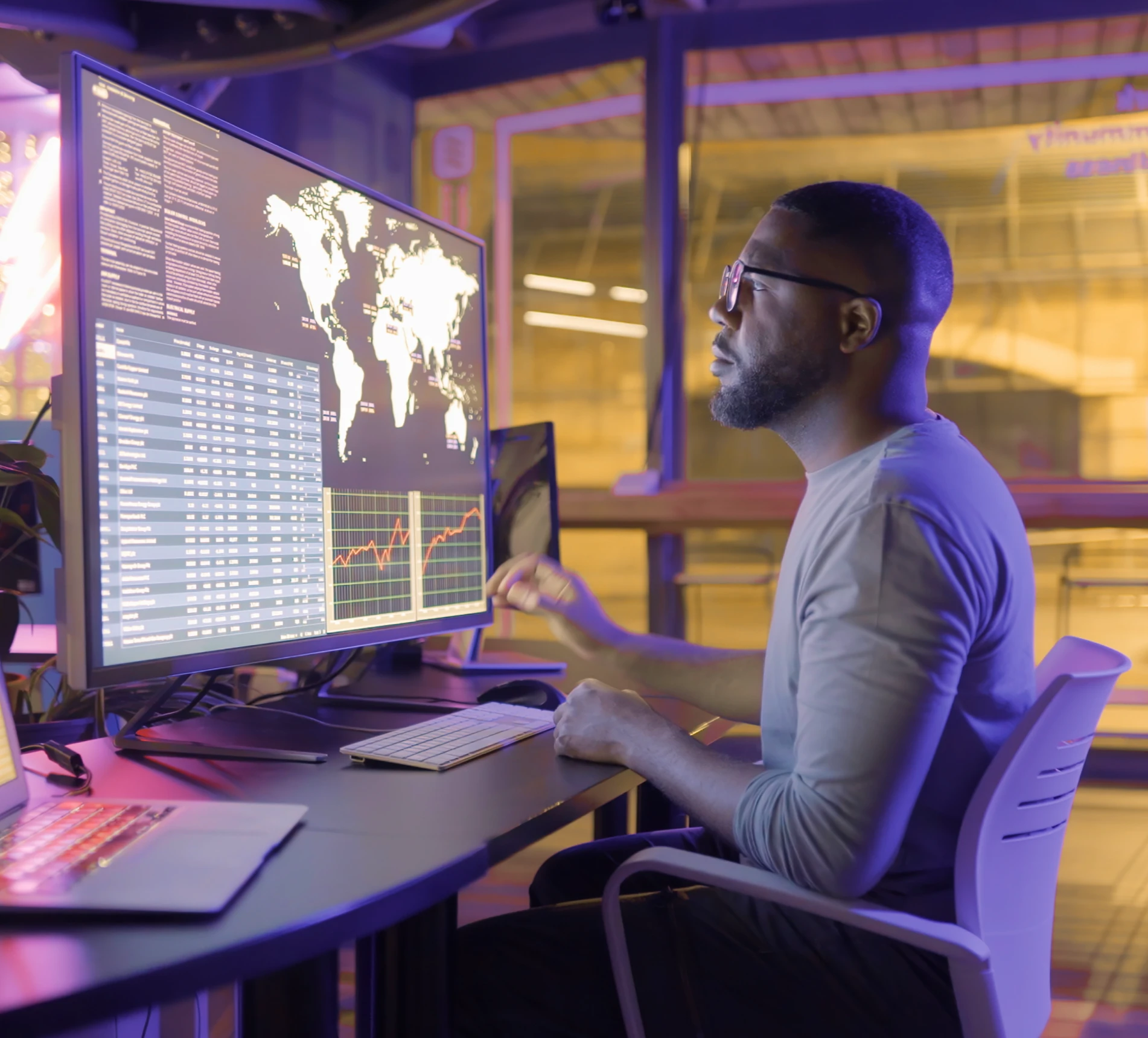 Person working with global financial data charts