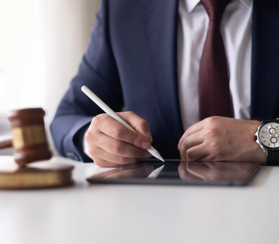 Businessman signing document digitally