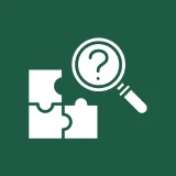 Magnifying glass over puzzle with question mark